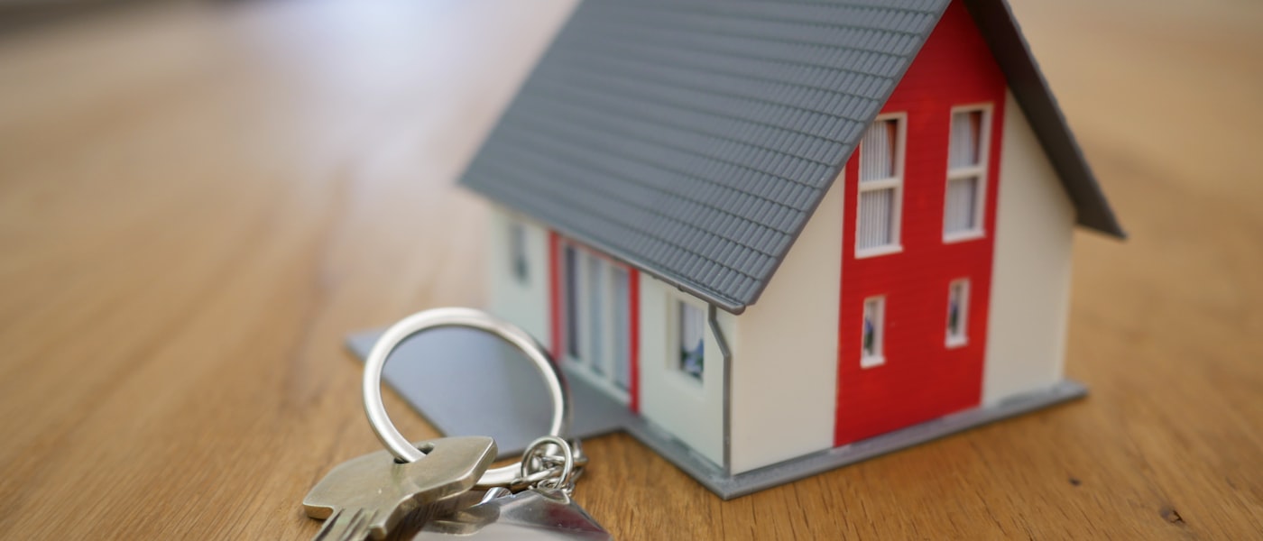 House with coins — council tax bands England guide